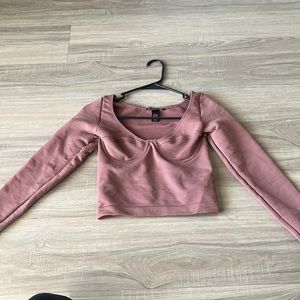 Victoria secret magenta cropped long sleeve in size small.